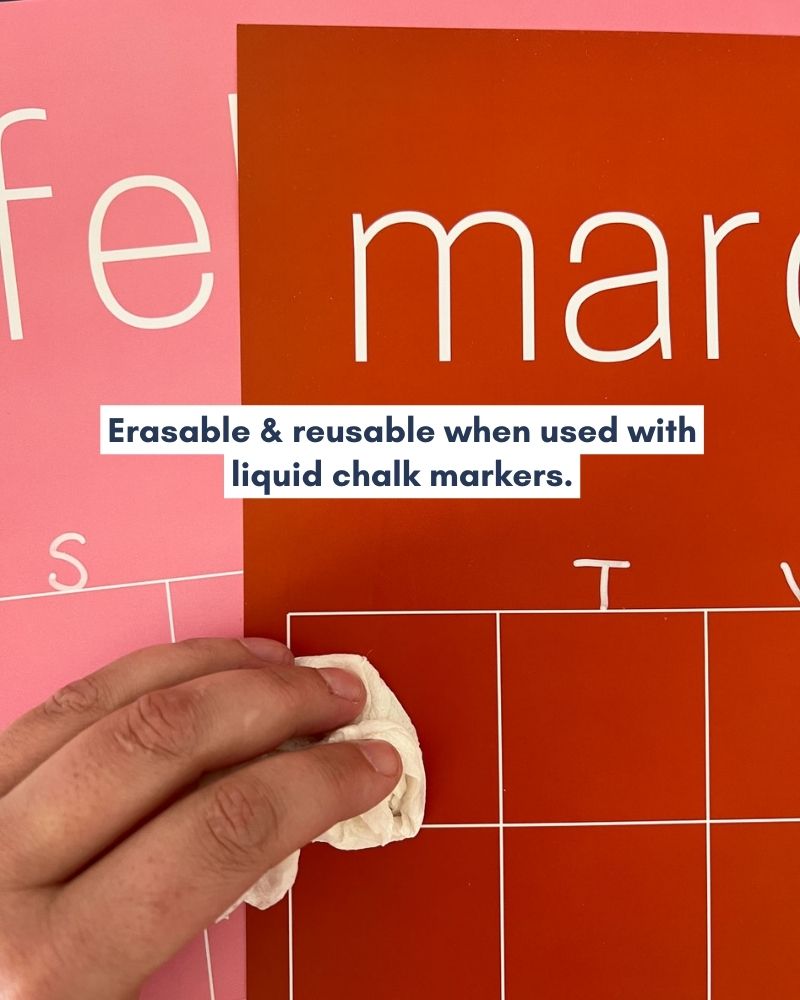 Close up of February and March pages of the rainbow wall calendar with the graphic "Erasable & reusable when used with liquid chalk markers."