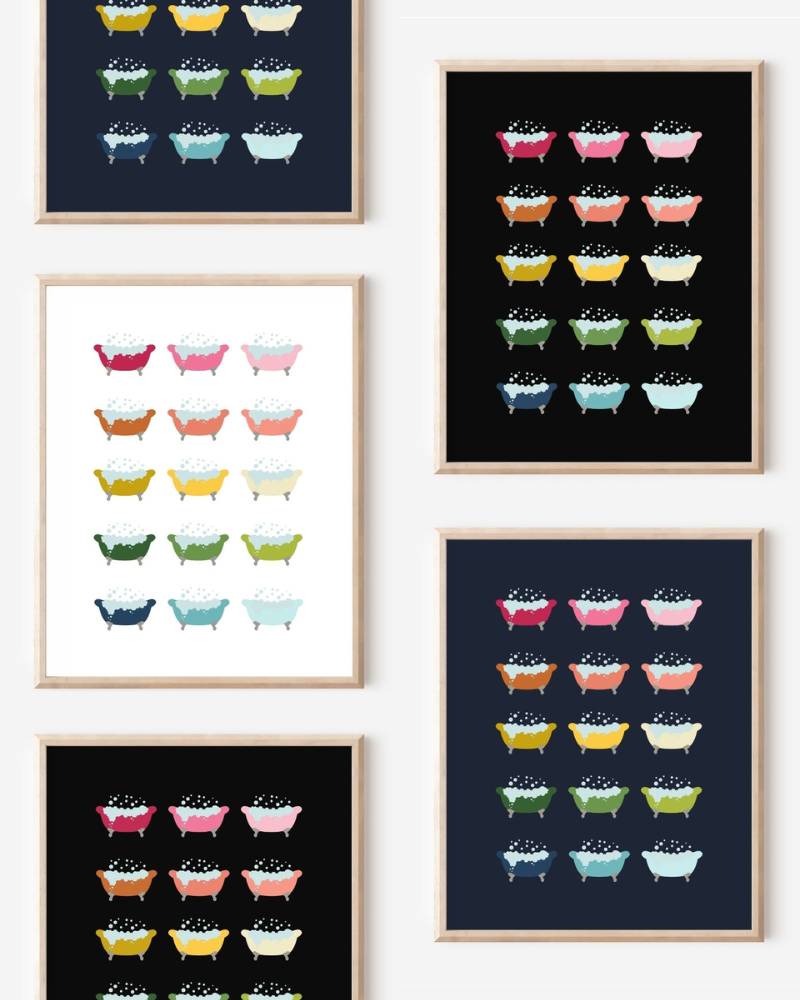 Framed art prints featuring minimalist illustrations of Bathtubs in rainbow hues on black, navy blue and white backgrounds.