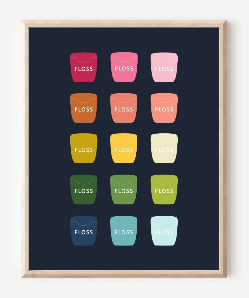 Bathroom wall art print of dental floss containers in rainbow hues arranged in a modern grid on navy background.