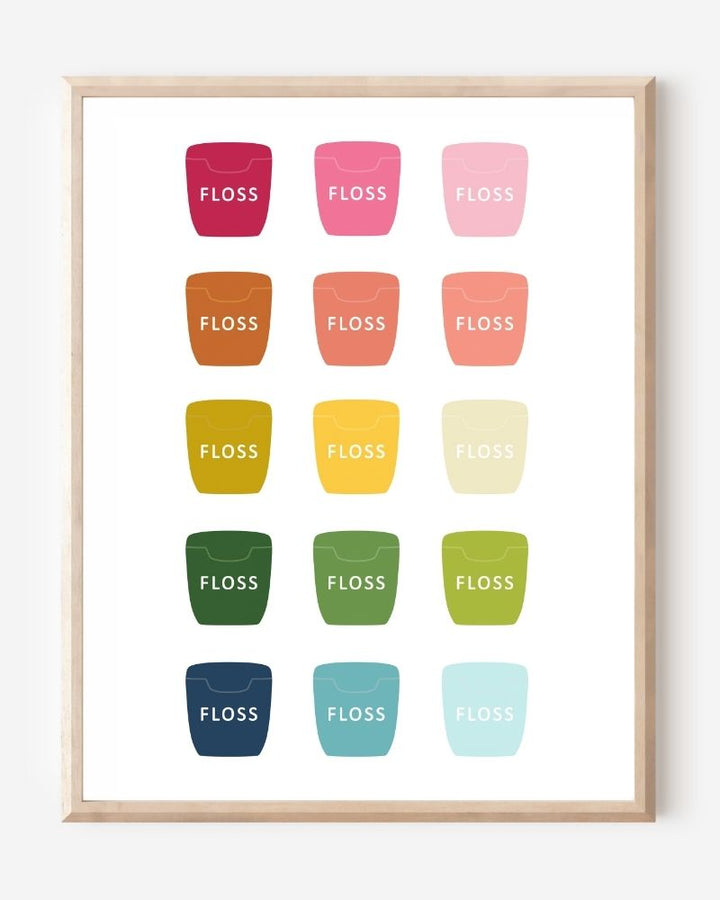 Bathroom wall art print of dental floss containers in rainbow hues arranged in a modern grid on white background.