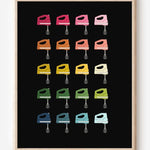 Minimalist art print of hand mixers in ombre rainbow hues on a black  background.
