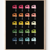 Minimalist art print of hand mixers in ombre rainbow hues on a black  background.