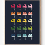 Minimalist art print of hand mixers in ombre rainbow hues on a navy background.