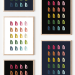 Framed art prints featuring minimalist illustrations of Irons in rainbow hues on black, navy blue and white backgrounds.