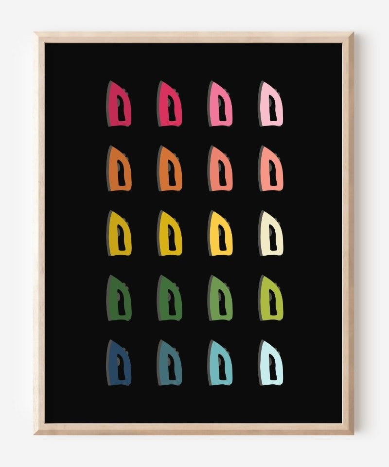Laundry room wall art print of irons in rainbow hues arranged in a modern grid on a black background--a fun pop of color for laundry or utility spaces.