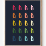 Laundry room wall art print of irons in rainbow hues arranged in a modern grid on a navy blue background--a fun pop of color for laundry or utility spaces.