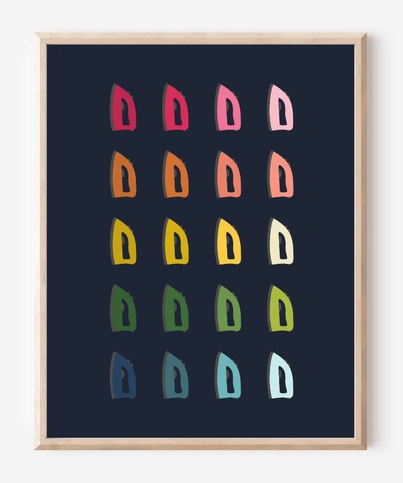 Laundry room wall art print of irons in rainbow hues arranged in a modern grid on a navy blue background--a fun pop of color for laundry or utility spaces.