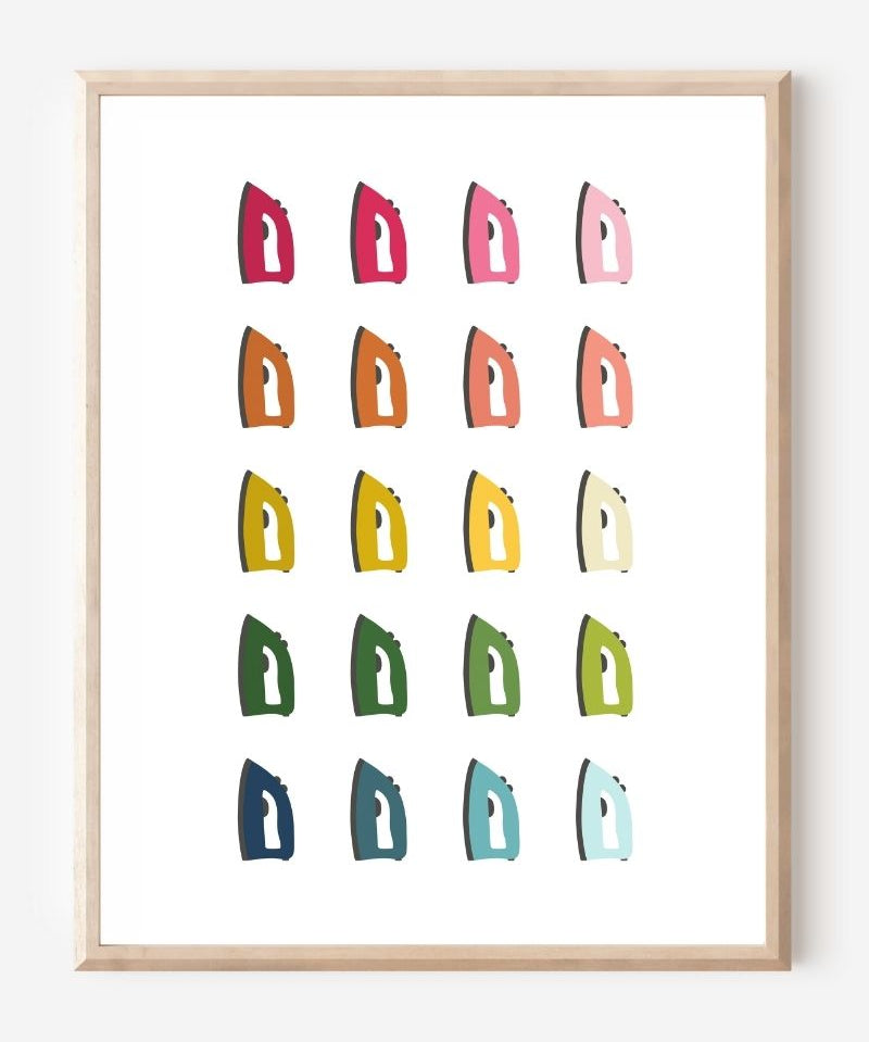 Laundry room wall art print of irons in rainbow hues arranged in a modern grid on a white background--a fun pop of color for laundry or utility spaces.