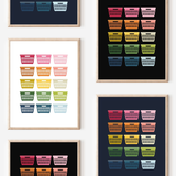 Framed art prints featuring minimalist illustrations of Laundry Baskets in rainbow hues on black, navy blue and white backgrounds.