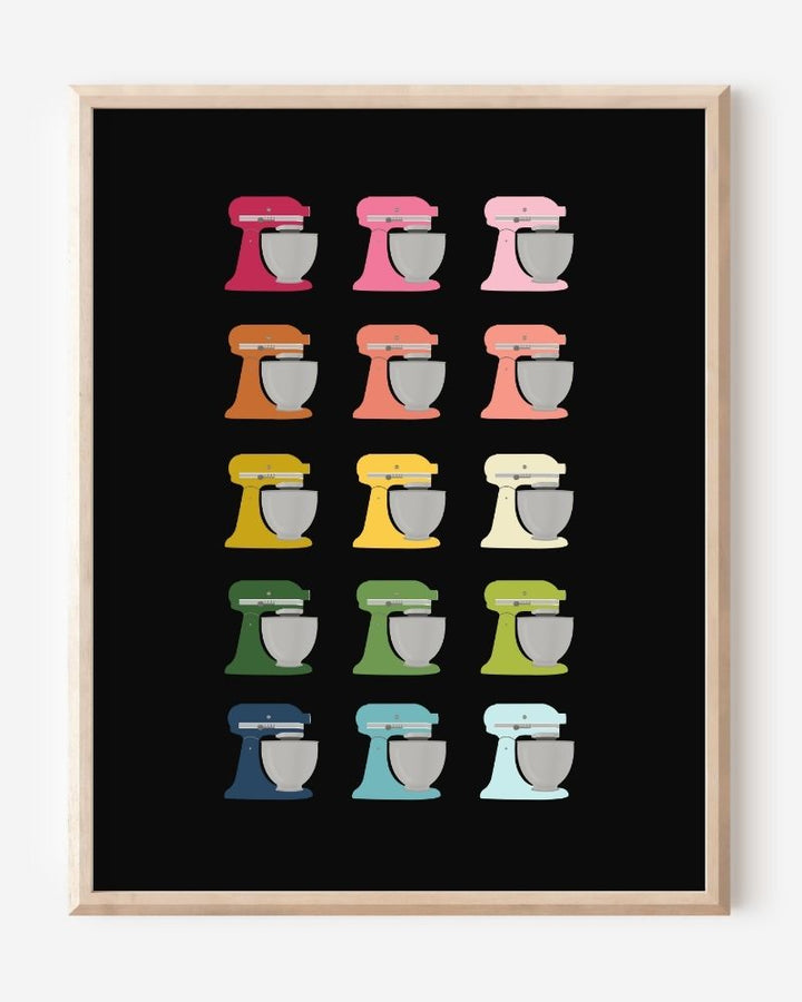 Graphic kitchen art print of colorful stand mixers in rainbow hues on black background.