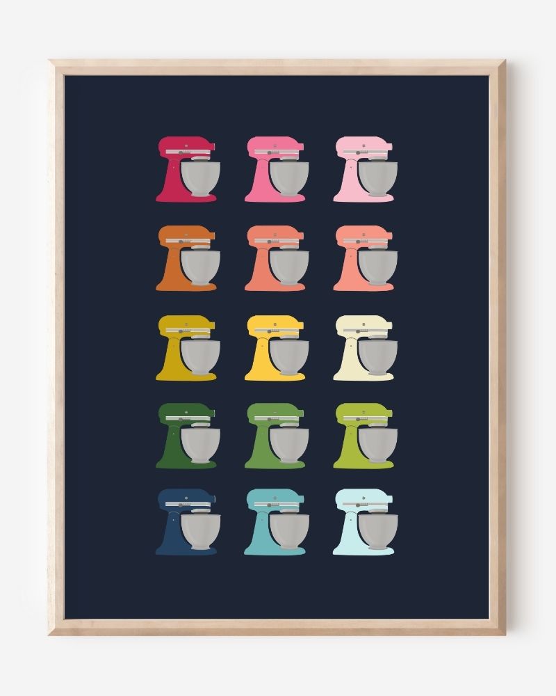 Graphic kitchen art print of colorful stand mixers in rainbow hues on navy background.