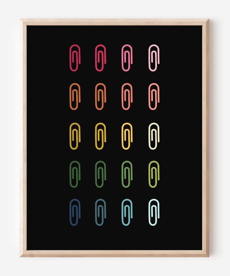 Minimalist modern wall art print featuring colorful paper clips in rainbow colors arranged neatly in a grid on a black background.