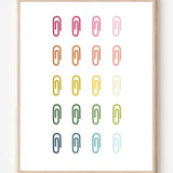 Minimalist modern wall art print featuring colorful paper clips in rainbow colors arranged neatly in a grid on a white background.
