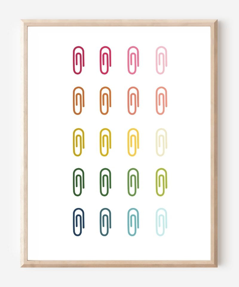Minimalist modern wall art print featuring colorful paper clips in rainbow colors arranged neatly in a grid on a white background.