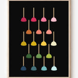 Modern bathroom art print showing colorful toilet plungers in rainbow hues arranged in a neat grid on a black background.