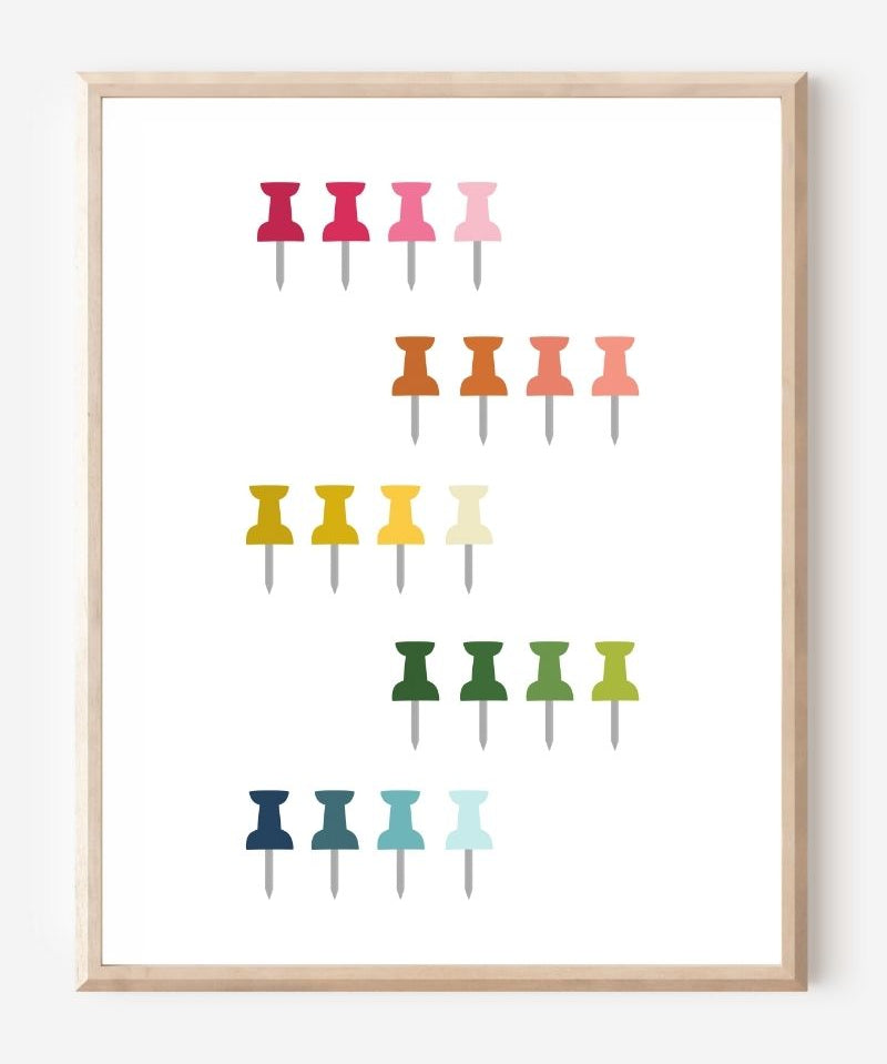 Graphic art print showing colorful push pins in rainbow colors laid out in a clean grid on a white background, playful modern wall art for studios and offices.