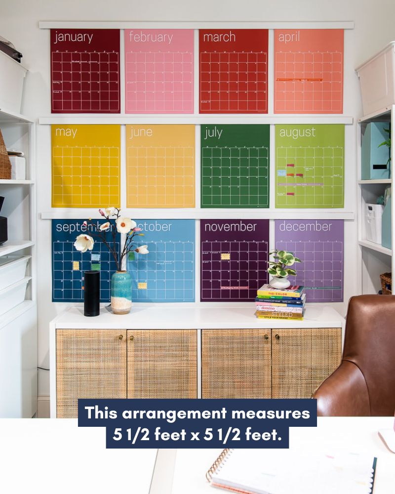 photo of large wall calendar in colorful rainbow hues from Kaleidoscope Living hanging in home office