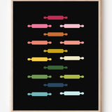 Kitchen wall art featuring rolling pins in ombre rainbow hues arranged in a grid pattern on a black background.
