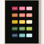 Graphic art print of bars of soap in rainbow hues arranged in neat rows on black background.