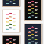 Framed art prints featuring minimalist illustrations of Tape Dispensers in rainbow hues on black, navy blue and white backgrounds.