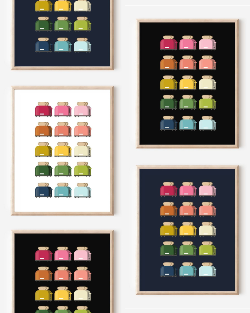 Framed art prints featuring minimalist illustrations of Toasters in rainbow hues on black, navy blue and white backgrounds.