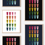 Framed art prints featuring minimalist illustrations of Toilets in rainbow hues on black, navy blue and white backgrounds.