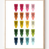 Bathroom wall art print of toilets in rainbow hues arranged in a modern grid on white background.