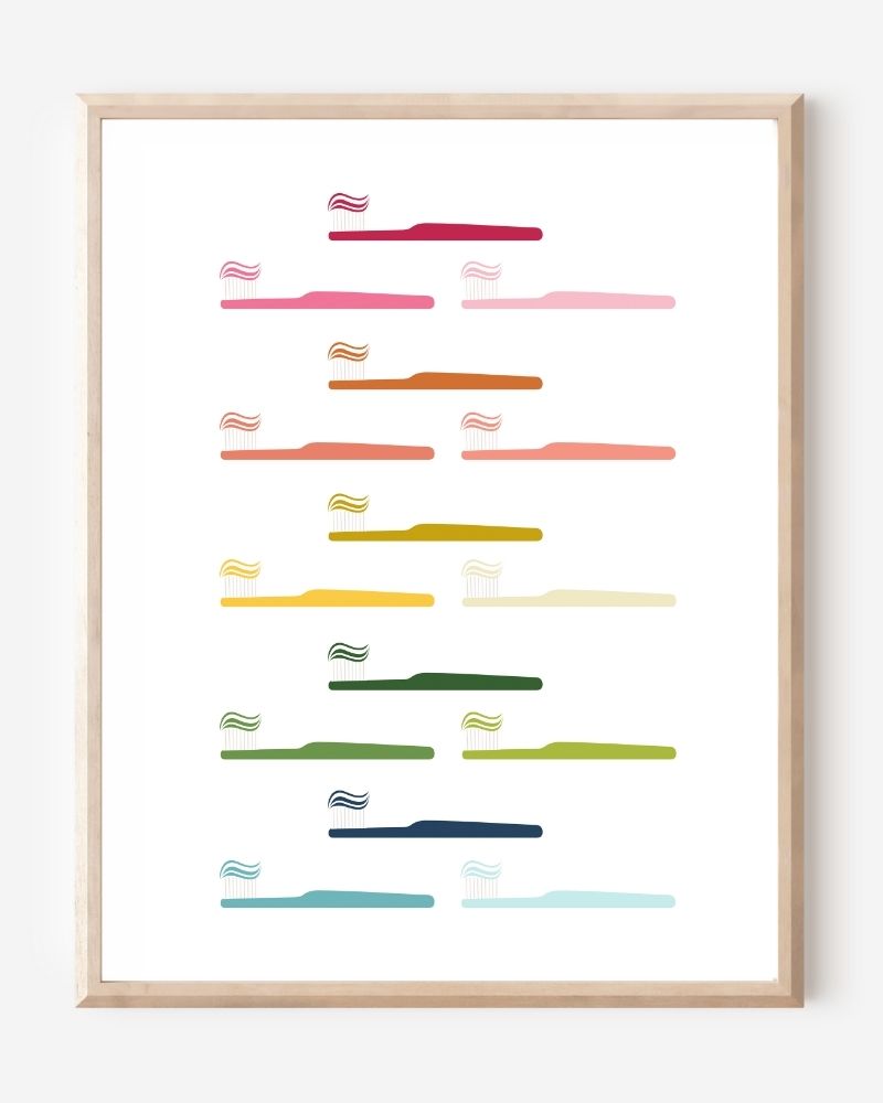Modern bathroom art print of toothbrushes in rainbow colors arranged in rows on white background.