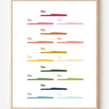 Modern bathroom art print of toothbrushes in rainbow colors arranged in rows on white background.