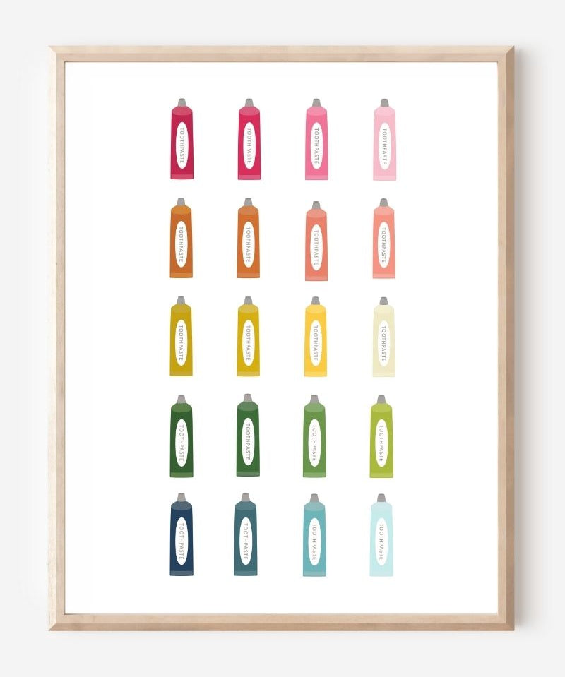 Minimalist bathroom wall art print showing colorful toothpaste tubes in a grid on a white background.