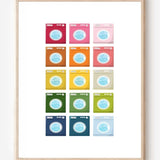 Laundry room art print showing colorful washing machines in a playful grid pattern on a white background. 