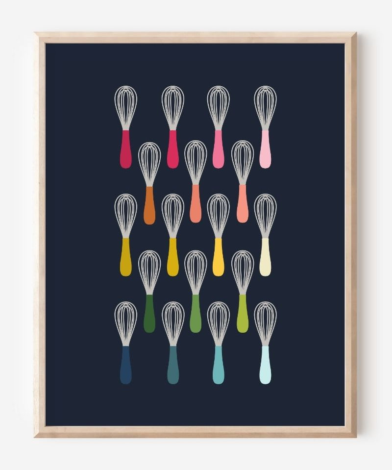 Kitchen wall art showing simple graphic whisks in ombre rainbow hues arranged in rows on a navy background.