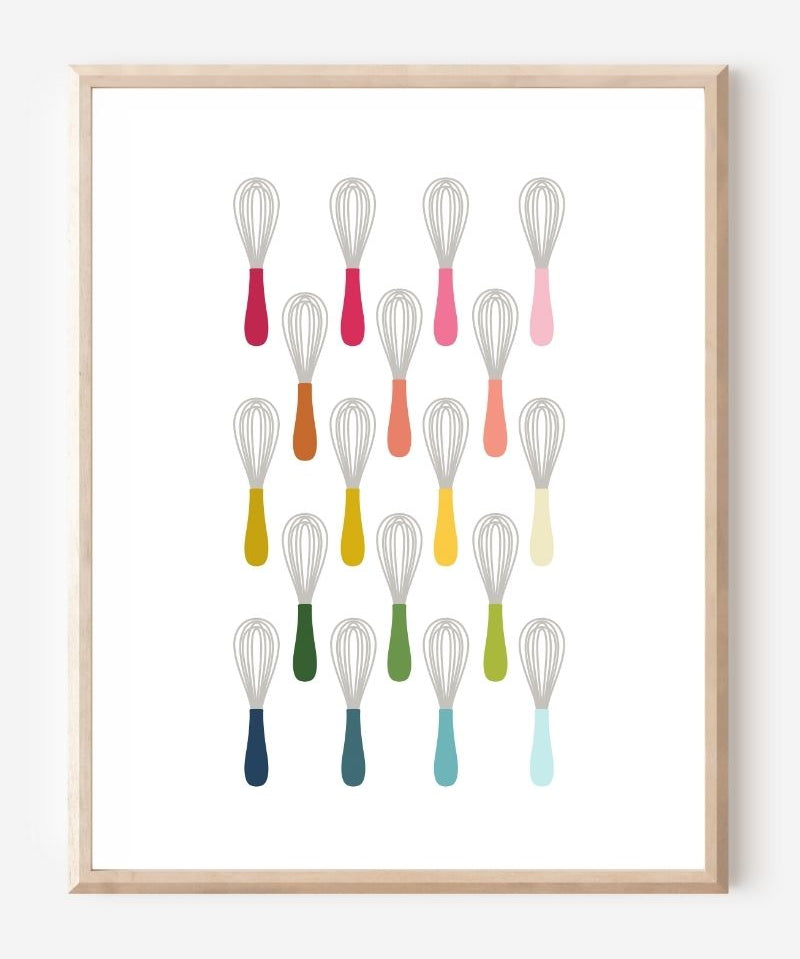 Kitchen wall art showing simple graphic whisks in ombre rainbow hues arranged in rows on a white background.