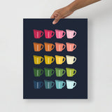 kitchen art print with a navy background and grid of colorful clip art of measuring cups in ombre rainbow colors ranging from pinks to blues