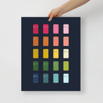 kitchen art print with a navy background and grid of colorful clip art of refrigerators in ombre rainbow colors ranging from pinks to blues