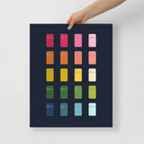 kitchen art print with a navy background and grid of colorful clip art of refrigerators in ombre rainbow colors ranging from pinks to blues