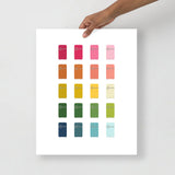 kitchen art print with a white background and grid of colorful clip art of refrigerators in ombre rainbow colors ranging from pinks to blues