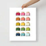 kitchen art print with a white background and grid of colorful clip art of toasters in ombre rainbow colors ranging from pinks to blues