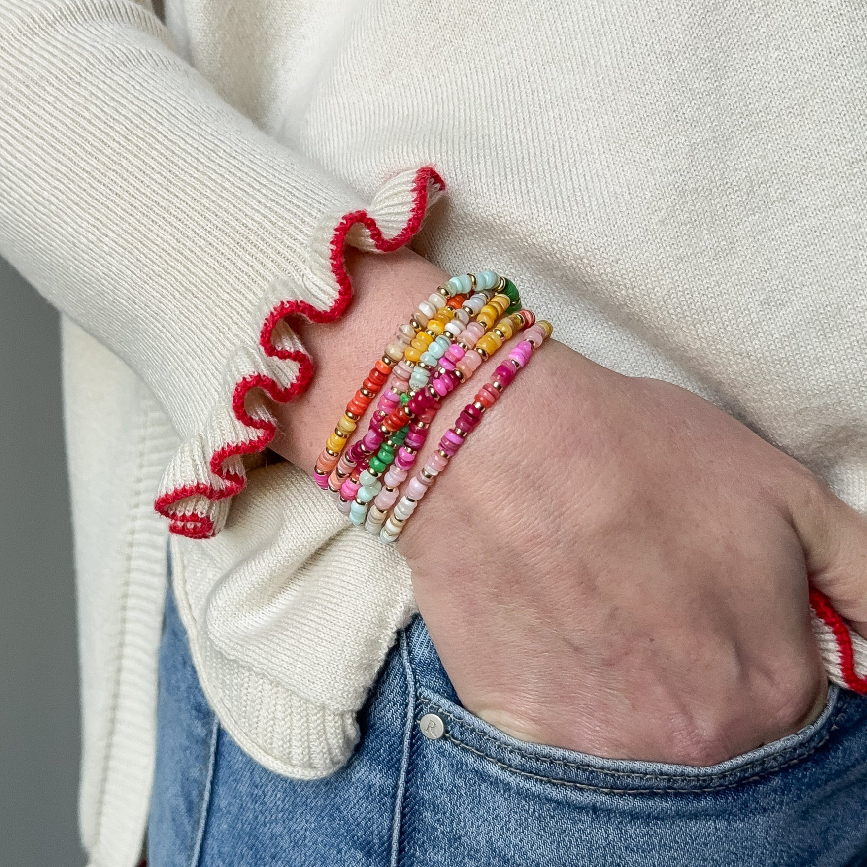 Set of rainbow beaded stretch bracelets with gold bead accents from Kaleidoscope Living