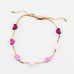 Adjustable gold chain bracelet with pink enamel hearts from Kaleidoscope Living.