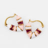 Pair of gold, pink and burgundy striped heart shaped huggies by Kaleidoscope Living.