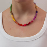 Colorful beaded necklace show on a women with a white shirt by Kaleidoscope Living