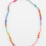 Multicolored beaded necklace with a neon color changing cord and gold clasp.