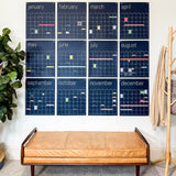 large reusable wall calendar in navy blue with colorful washi tape and sticky notes included for important appointments from Kaleidoscope Living