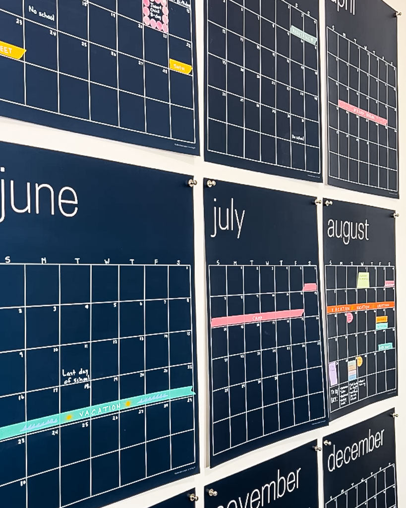 close up view of large erasable navy blue wall calendar from Kaleidoscope Living