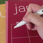 video demonstrating features of large reusable and erasable rainbow spectrum wall calendar from Kaleidoscope Living