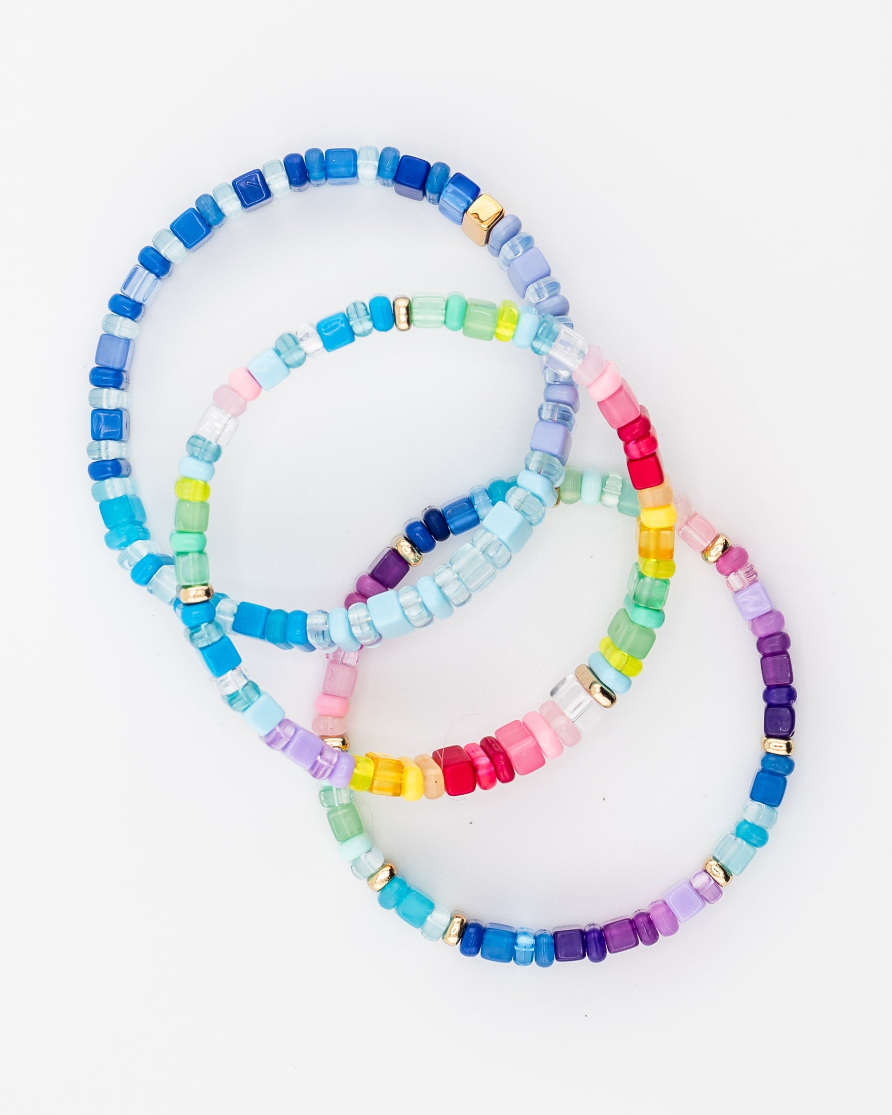 Set of three colorful resin tile bracelets with gold accents by Kaleidoscope Living.