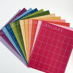 letter-size monthly wall calendar in spectrum of rainbow colors by Kaleidoscope Living