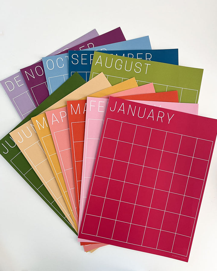 letter-size monthly wall calendar in rainbow colors by Kaleidoscope Living