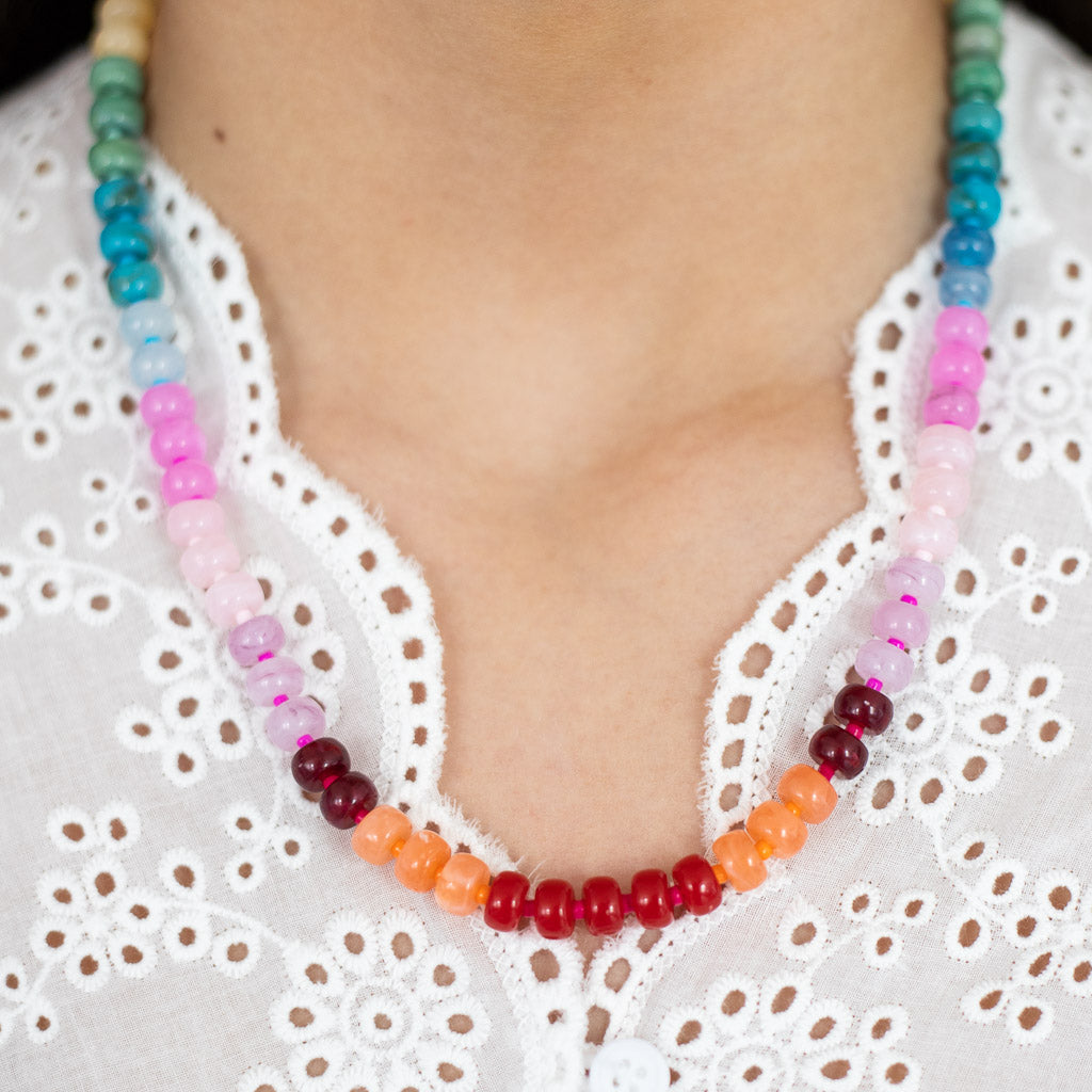 Resin beaded Necklace in warm rainbow hues including reds, purples and blues by Kaleidoscope Living